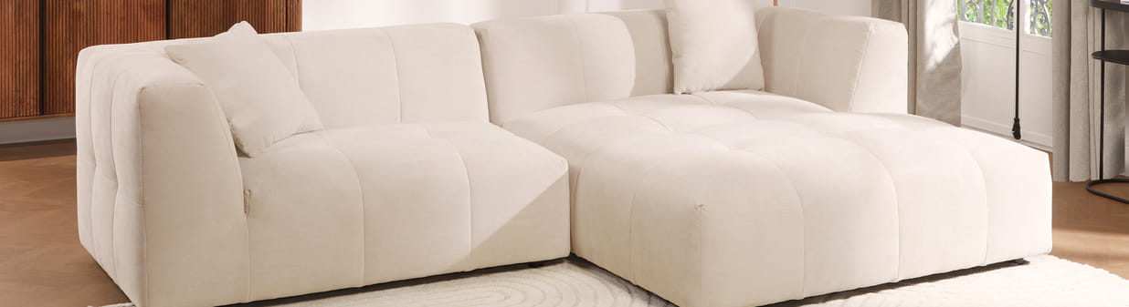 Welke bank moet u kopen voor uw design woonkamer?